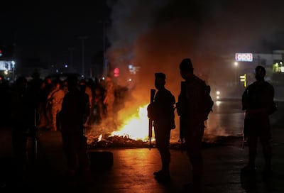 Lebanese army soldiers stand guard at a protest in the town of Antelias. Reuters