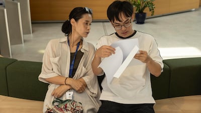Ryotaro at Arcadian British School with his mother Maiko, who flew over from Japan for the results