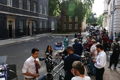Media gather outside 10 Downing Street in anticipation of a statement from British Prime Minister Keir Starmer. Reuters