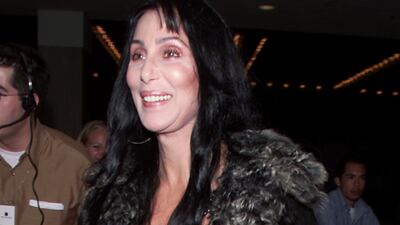 Cher, in tie-dye trousers and a printed tee, at the premiere of 'The Cell' in Century City, California, August 17, 2000. Getty Images