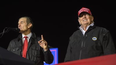 US Senate hopeful Dr Mehmet Oz joins former president Donald Trump at a rally in Greensburg, Pennsylvania. Getty Images / AFP
