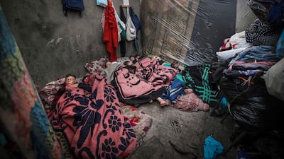 Displaced Palestinians sleep in a tent in Rafah, southern Gaza Strip. AFP