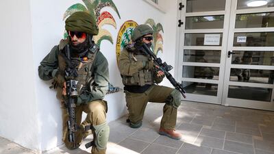 Members of the Israeli army special forces take part in a "terrorist attack" simulation at a school in northern Israel, near the border with Jordan, on October 26. AFP