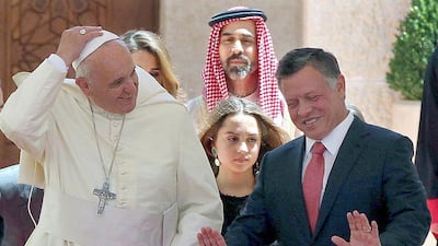 Pope Francis, third from right, with King Abdullah II of Jordan, centre-left, and Queen Rania, top-centre, as they visit Bethany, a site on the eastern bank of the River Jordan. Sami Khahman/AFP Photo