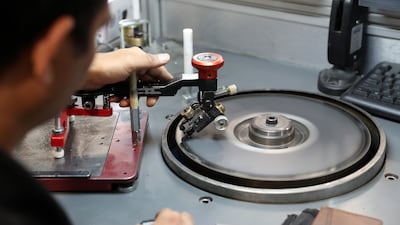 Staff polish the diamonds into shape