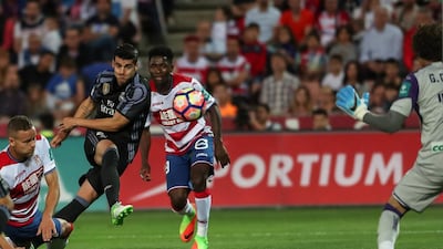 Real Madrid’s Alvaro Morata scores Real Madrid’s third goal. Pepe Marin / Reuters