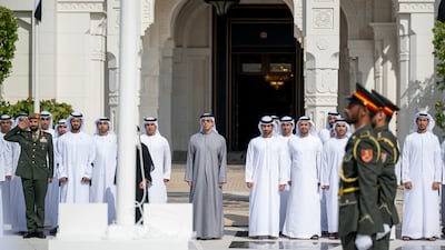 Sheikh Mansour attends the flag-raising ceremony at Qasr Al Watan. WAM