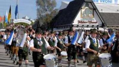 A Bavarian marching band in traditional lederhosen take part in a folk parade at the Munich Oktoberfest last year.