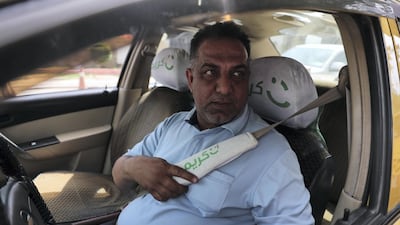 A Careem driver in Baghdad. Ahmad Al-Rubaye for The National