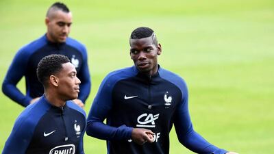 Paul Pogba, right, is expected to start for France in Sunday's Group A clash with Switzerland. Franck Fife / AFP