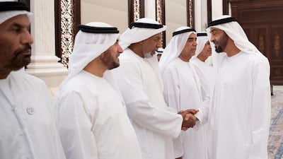 HH Sheikh Mohamed bin Zayed Al Nahyan Crown Prince of Abu Dhabi Deputy Supreme Commander of the UAE Armed Forces (R), greets a retired member of the UAE Armed Forces during an iftar reception at Al Bateen Palace. Saeed Al Neyadi / Crown Prince Court - Abu Dhabi