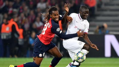 Chelsea's N'Golo Kante, right, vies with Lille's Renato Sanches. AFP