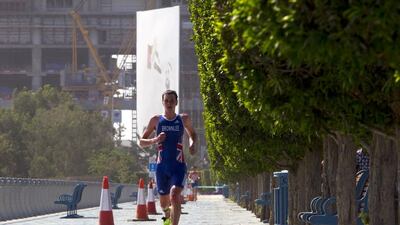 Alistair Brownlee of Britain races to victory during the running portion of the male short distance of the Abu Dhabi International Triathlon in Abu Dhabi on March 2, 2013. Christopher Pike / The National