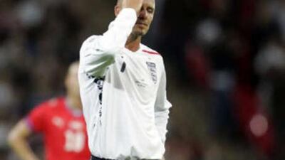 England's David Beckham looks dejected during his team's below-par performance.