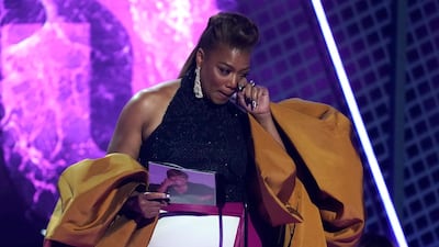 Queen Latifah reacts as she accepts the Lifetime Achievement Award at the BET Awards. AP