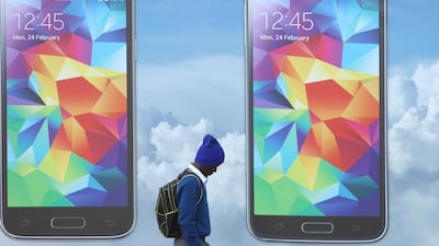 Mobile phone advertising billboard in Johannesburg, South Africa. Mobile phone banking is replacing traditional bank outlets across Africa. AP