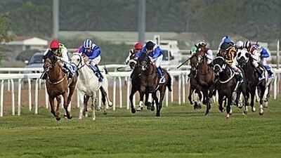 Ted Durcan rides Shadiyda, left, to a comfortable big-race victory last night.