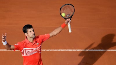 Djokovic reacts after winning a point against Nadal. AFP