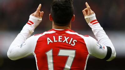 Arsenal’s Alexis Sanchez celebrates after scoring a goal during his side's 3-1 Premier League victory against Stoke City at the Emirates Stadium on Sunday. Eddie Keogh / Reuters