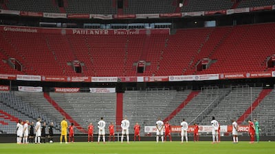 Players pay a minute of silence for the victims of the coronavirus prior. AP