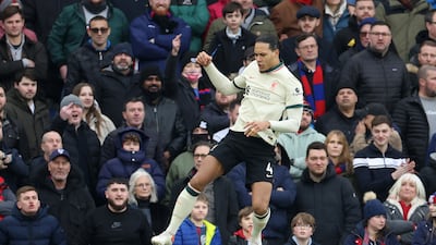 Liverpool's Virgil van Dijk celebrates scoring their first goal. Reuters