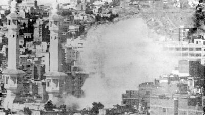 Smoke billows from Makkah's Great Mosque, which was attacked on November 20, 1979 by gunmen belonging to a group commanded by Juhayman al-Oteibi, alias "Lieutenant Mahdi" (the Messiah). AFP