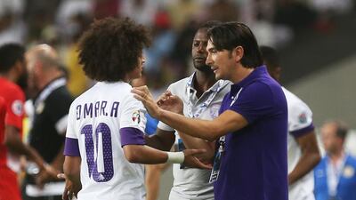 Al Ain coach Zlatko Dalic gives sideline tips to his player, Omar Abdulrahman during their game against Al Jazira n Al Ain on Tuesday night, May 13, 2014. DELORES JOHNSON / The National