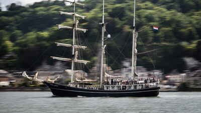 The Thalass sails down the Seine river to reach Rouen, part of a gathering of old vessels and tall ships in Sahurs, north-western France. AFP