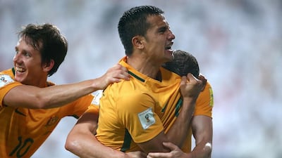 Tim Cahill celebrates scoring the winning goal for Australia against the UAE in the 2018 World Cup qualifier in Abu Dhabi. Francois Nel / Getty Images