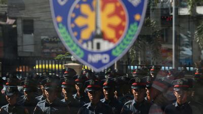 New brooms to sweep he police clean: new police trainees at the Caloocan City Police Station in metropolitan Manila, Philippines on Friday, September 15, 2017. All 1,200 members of Caloocan city police force in metropolitan Manila are to be sacked and retrained after some of its members were suspected in the gruesome killings of three teenagers and were caught by closed circuit television robbing a house. Aaron Favila / AP