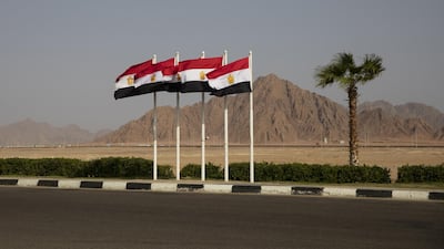 Egyptian flags fly in Sharm El Sheikh. Getty