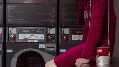 Change of scene — Photography: Manbutte at Things By People; Fashion director: Sarah Maisey; and Stylist: Hafsa Lodi. Dress, Dh20,050; jacket, Dh28,350; brooch, Dh2,280, all from Chanel. Shoes, Dh2,100, Jimmy Choo. Bag, Dh1,210, The Good Practice at S*uce. Socks, stylist’s own