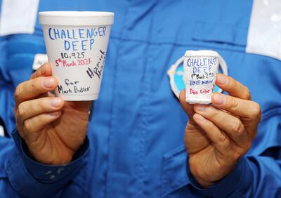 Explorer Hamish Harding shows what deep atmospheric pressure can do a polystyrene cup. Chris Whiteoak / The National