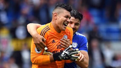 Goalkeeper: Neil Etheridge (Cardiff) – The Philippines international made history by beginning his Premier League career with penalty saves in his first two games. AP Photo