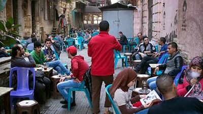 Unhappiness with bleak job prospects was among the many seeds of protests in parts of the Arab world. Above, young unemployed men in Cairo. David Degner for The National