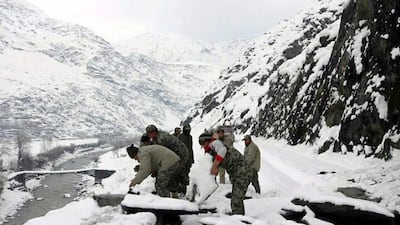 Members of Pakistan’s Chitral Scouts try to reach avalanche-hit areas in Chitral district February 5, 2017. Avalanches have killed at least 10 people in the area and more than 100 across the border in Afghanistan. Hammad Khan Farooqi / EPA