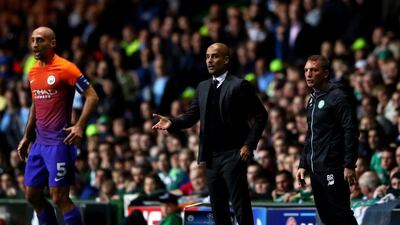 Manchester City manager Pep Guardiola reacts on the touchline during the Champions League match against Celtic. Michael Steele / Getty Images
