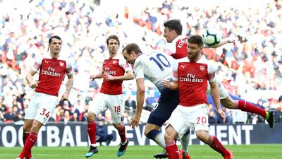 Kane is fouled by Shkodran Mustafi of Arsenal resulting in a penalty. Getty Images