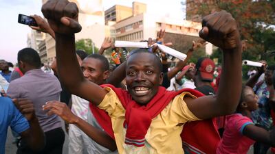 Zimbabweans celebrate after president Robert Mugabe resigns in Harare. Mike Hutchings / Reuters