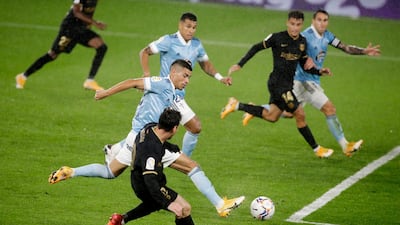 Celta Vigo’s Lucas Olaza scores an own goal and Barcelona’s second. Reuters