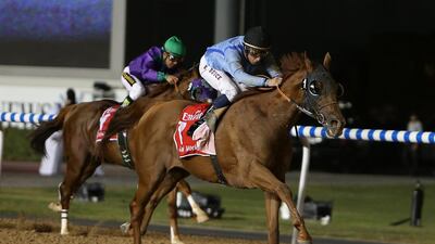 Prince Bishop, right, ridden by William Buick won the Dubai World Cup at the Meydan Racecourse in Dubai. Pawan Singh / The National