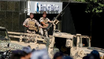 Lebanese army soldiers stand guard in Beirut's financial district on October 19, 2019. AFP