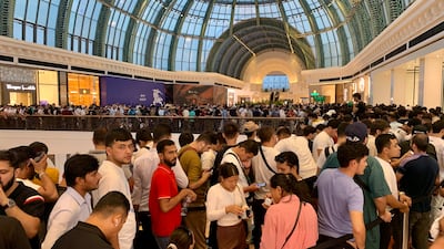 People queue for the iPhone 15 at Mall of the Emirates in Dubai. Pawan Singh / The National