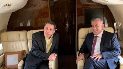 Mr. Zakka is pictured with Major General Ibrahim aboard the plane. Reuters