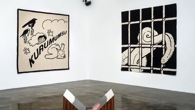 Three works from the exhibit, including Rahlé for Richard, made of veneer on MDF, foreground,Love Letters No 8, left, and Love Letters No 2, both made of wool and yarn. Courtesy Third Line