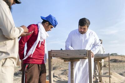 Saif Al Ali is one of many volunteers making new discoveries about the UAE. Reem Mohammed/The National