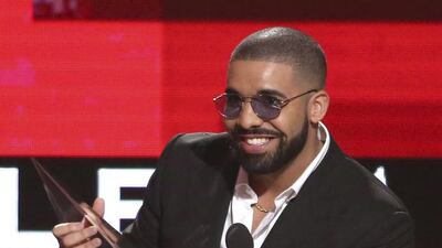 Drake accepts the award for favorite album rap/hip-hop for Views at the American Music Awards in Los Angeles. Matt Sayles / Invision / AP