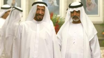 A reader mourns the death of Sheikh Mubarak bin Mohammed Al Nahyan, left, seen at his palace with his son Sheikh Nahyan bin Mubarak Al Nahyan.