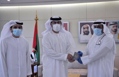 An emergency passport is issued to the Al Amiri family to allow young Zeina entry into the UAE from Kuwait. Courtesy: Wam