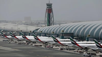 Dubai International Airport is the world's busiest by international passengers. The UAE will halt all passenger flights starting on March 25. AP Photo